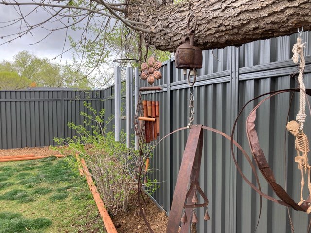 Contact Kokes Constructs LLC for Metal fence in a backyard